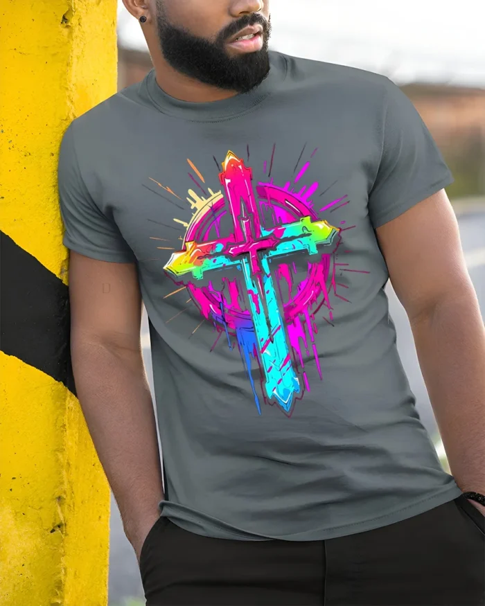 Neon Christian Cross T-Shirt Vibrant Faith Graphic - model in grey shirt leaning against column