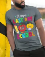Happy Last Day of School T-Shirt Colorful Teacher - model in grey shirt leaning against column