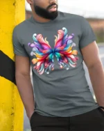Colorful Abstract Butterfly Graphic T-Shirt - model in grey shirt leaning against column