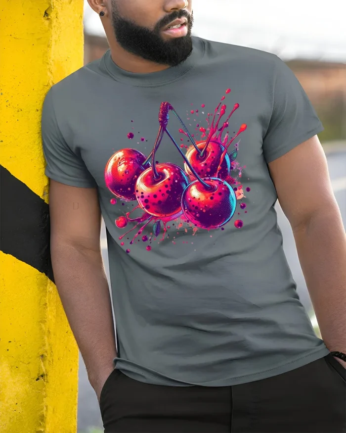 Neon Cherry Splash Fruit Art T-Shirt - model in grey shirt leaning against column
