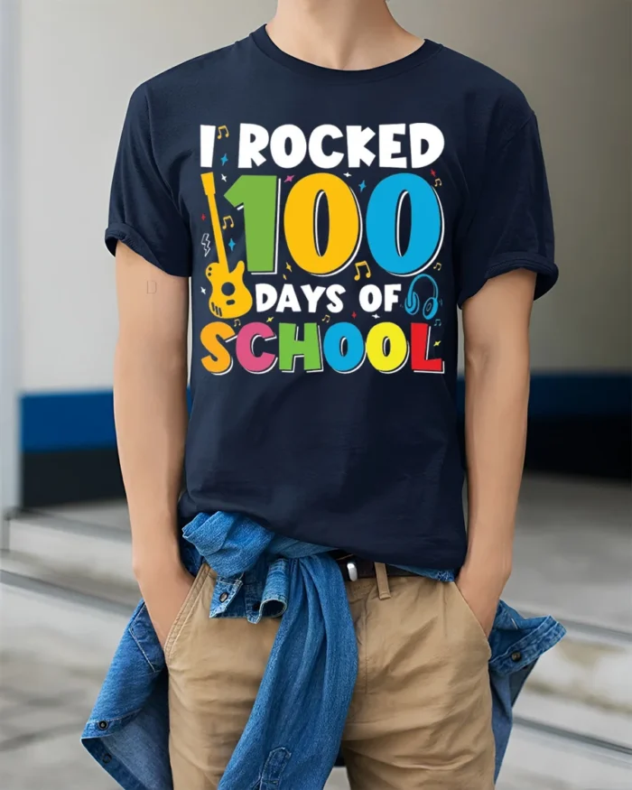 I Rocked 100 Days of School T-Shirt - model wearing navy shirt, hands in pockets