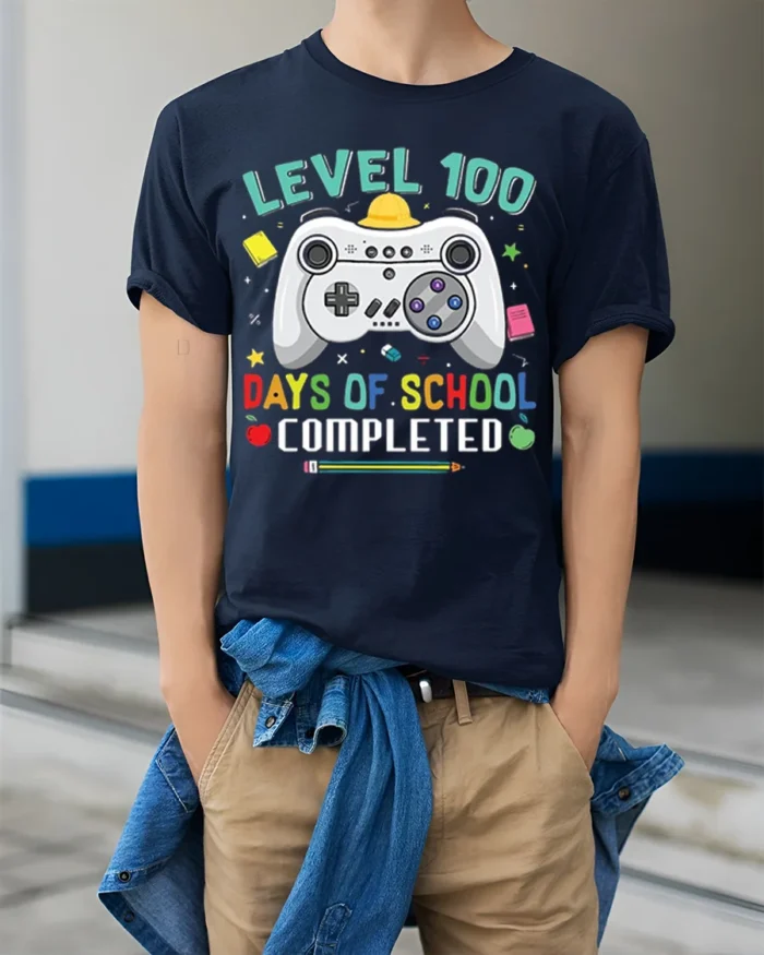 Level 100 Days of School Completed T-Shirt - model wearing navy shirt, hands in pockets