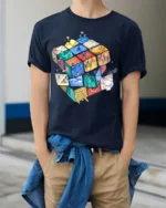 Colorful Puzzle Cube Art T-Shirt - model wearing navy shirt, hands in pockets