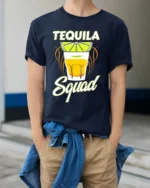 Tequila Squad Drinking Party T-Shirt for Summer Fun - model wearing navy shirt, hands in pockets