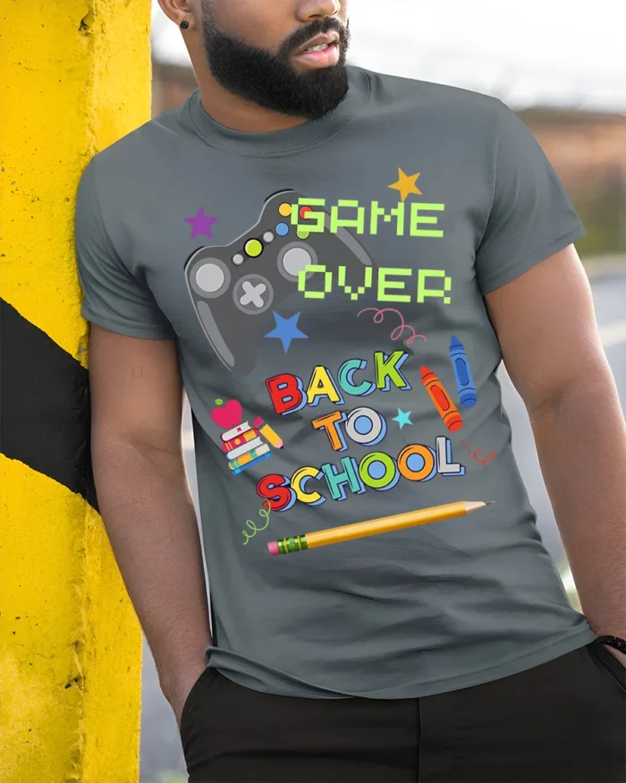 Game Over Back To School T-Shirt - model in grey shirt leaning against column