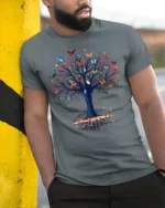 Butterfly Tree of Life T-Shirt with Nature Design - model in grey shirt leaning against column