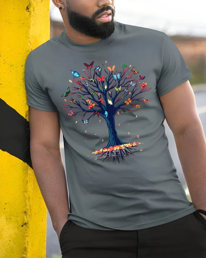 Butterfly Tree of Life T-Shirt with Nature Design - model in grey shirt leaning against column