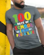 100 Days of School Pre-K Life T-Shirt - model in grey shirt leaning against column