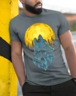 Howling Wolf Full Moon Graphic T-Shirt - model in grey shirt leaning against column