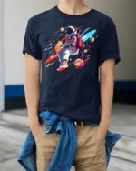 Colorful Astronaut T-Shirt - Space Art Design - model wearing navy shirt, hands in pockets