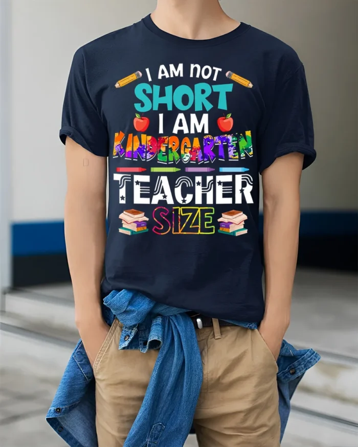 Funny Kindergarten Teacher Size T-Shirt - model wearing navy shirt, hands in pockets