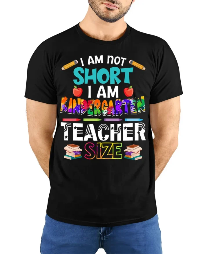Funny Kindergarten Teacher Size T-Shirt - model wearing black shirt, hands behind back