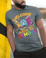 Welcome Back to School T-Shirt - Cute Cartoon Style - model in grey shirt leaning against column