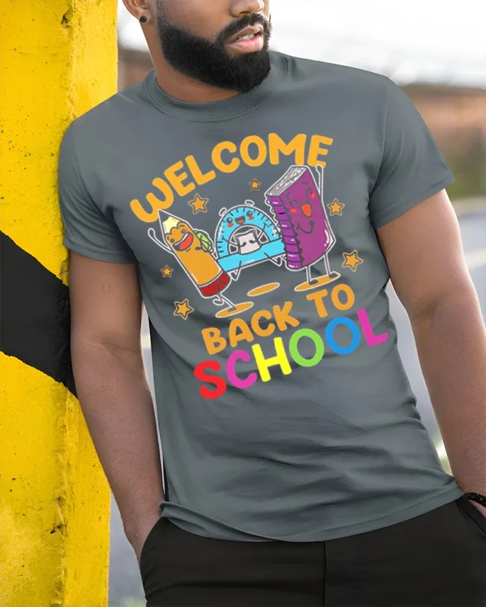 Welcome Back to School T-Shirt - Cute Cartoon Style - model in grey shirt leaning against column