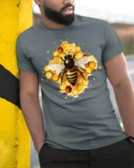 Honey Bee and Honeycomb Art Graphic T-Shirt - model in grey shirt leaning against column