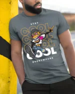 Urban Stay Cool Everywhere Graphic T-shirt - model in grey shirt leaning against column