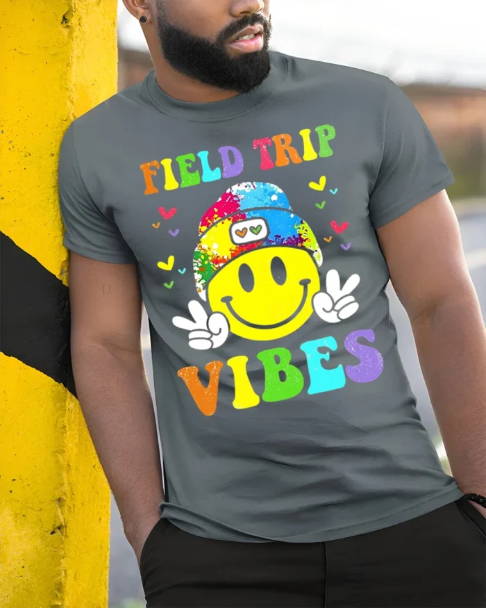 Field Trip Vibes Smiley Face Kids T-shirt - model in grey shirt leaning against column