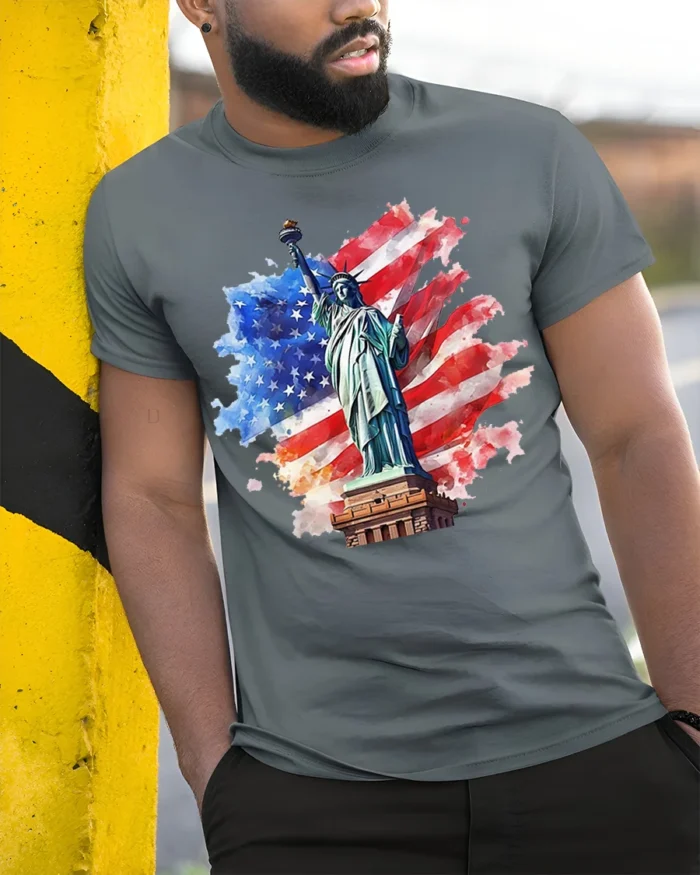 Statue of Liberty USA Flag Patriotic T-Shirt - model in grey shirt leaning against column
