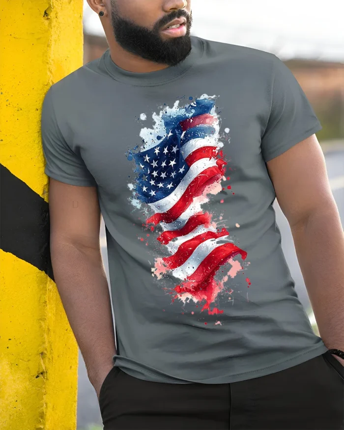 American Flag Watercolor Splash T-shirt - model in grey shirt leaning against column