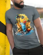 Tropical Beach Relaxation Sunset T-shirt - model in grey shirt leaning against column