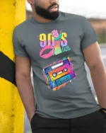 90s Cassette T-shirt with Retro Babe Vibe Art - model in grey shirt leaning against column