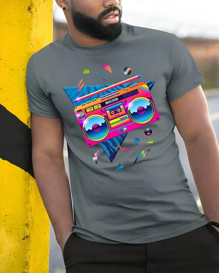 Retro Neon Boombox T-shirt with 80s Vibe Art - model in grey shirt leaning against column