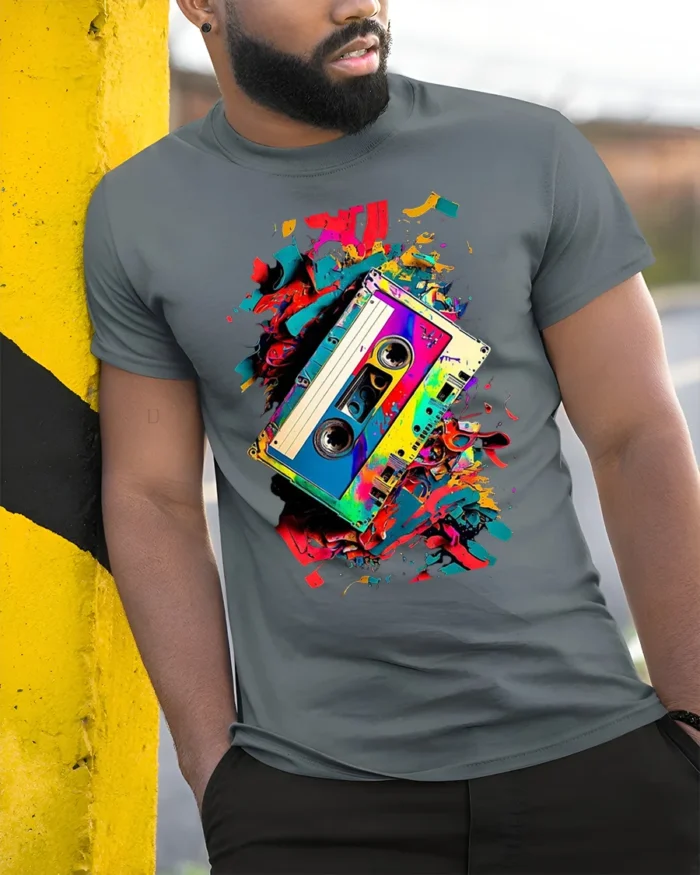 Retro Cassette Tape T-shirt with Color Splash Art - model in grey shirt leaning against column