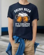 Drink Beer Cheaper Than Therapy T-shirt Funny - model wearing navy shirt, hands in pockets