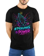 Praying Hands Faith Power Graphic T-shirt - model wearing black shirt, hands behind back