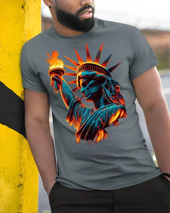 Statue of Liberty Flame Graphic T-shirt USA - model in grey shirt leaning against column