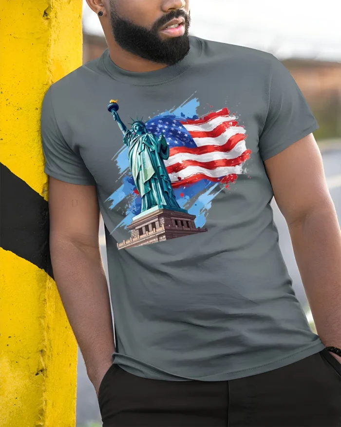 Statue of Liberty American Flag T-shirt USA - model in grey shirt leaning against column
