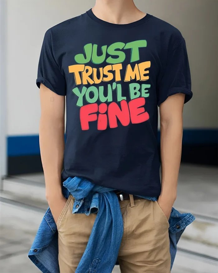 Just Trust Me You’ll Be Fine T-Shirt - model wearing navy shirt, hands in pockets
