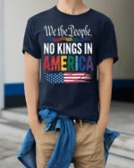 No Kings in America Patriotic Pride T-Shirt - model wearing navy shirt, hands in pockets