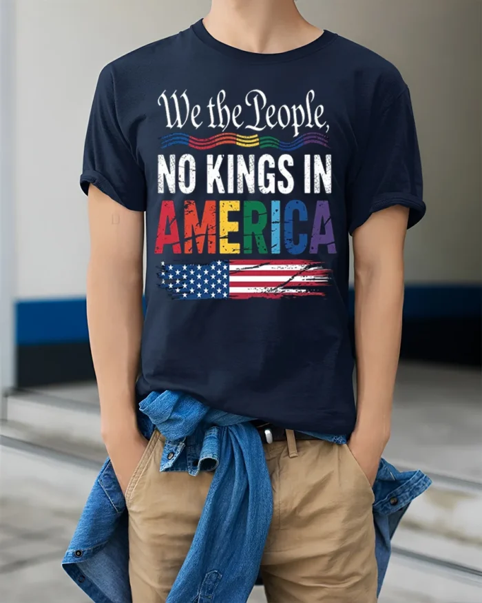No Kings in America Patriotic Pride T-Shirt - model wearing navy shirt, hands in pockets