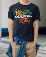 Never Underestimate Me Graffiti T-Shirt - model wearing navy shirt, hands in pockets