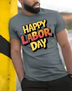 Bold Happy Labor Day Graphic T-Shirt USA - model in grey shirt leaning against column