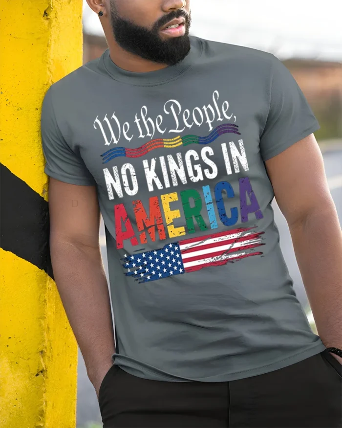 No Kings in America Patriotic Pride T-Shirt - model in grey shirt leaning against column