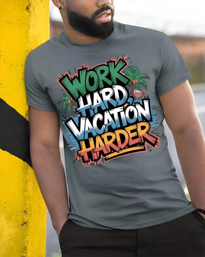 Work Hard Vacation Harder Graphic T-Shirt - model in grey shirt leaning against column