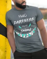 Hello Darkness My Old Friend T-Shirt - model in grey shirt leaning against column