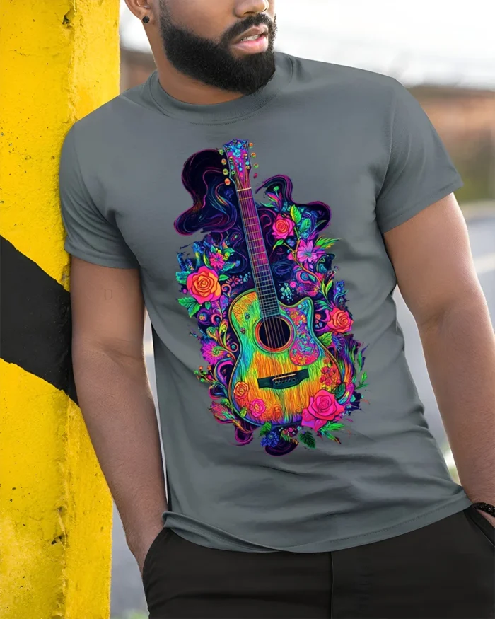 Neon Floral Acoustic Guitar Art Music T-Shirt - model in grey shirt leaning against column