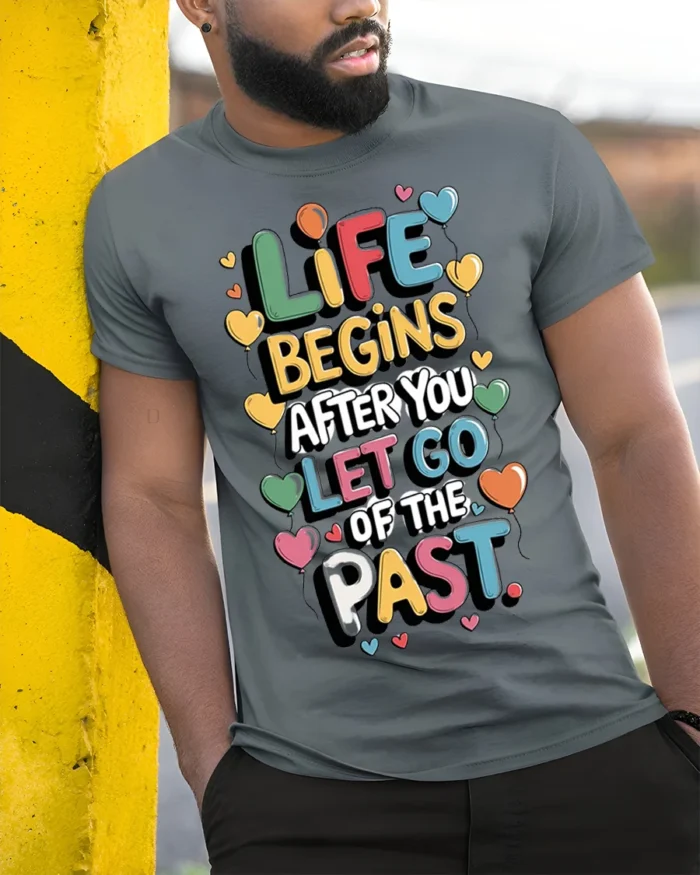 Life Begins Let Go of the Past Motivational T-Shirt - model in grey shirt leaning against column