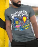 Bubblegum Gelato Street Art Graphic Black T-Shirt - model in grey shirt leaning against column