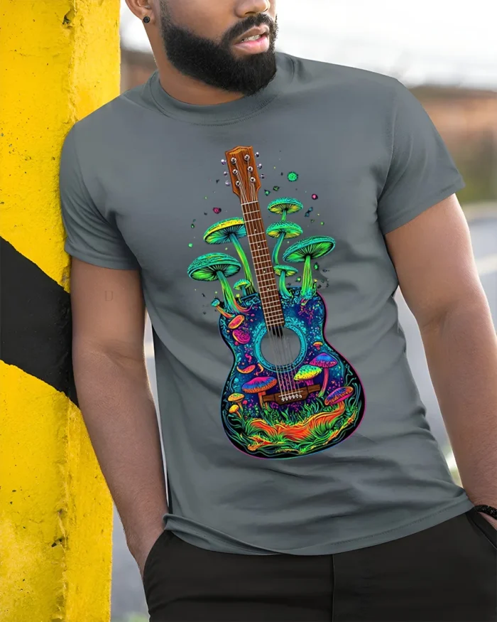 Psychedelic Guitar and Mushroom Art Graphic T-Shirt - model in grey shirt leaning against column