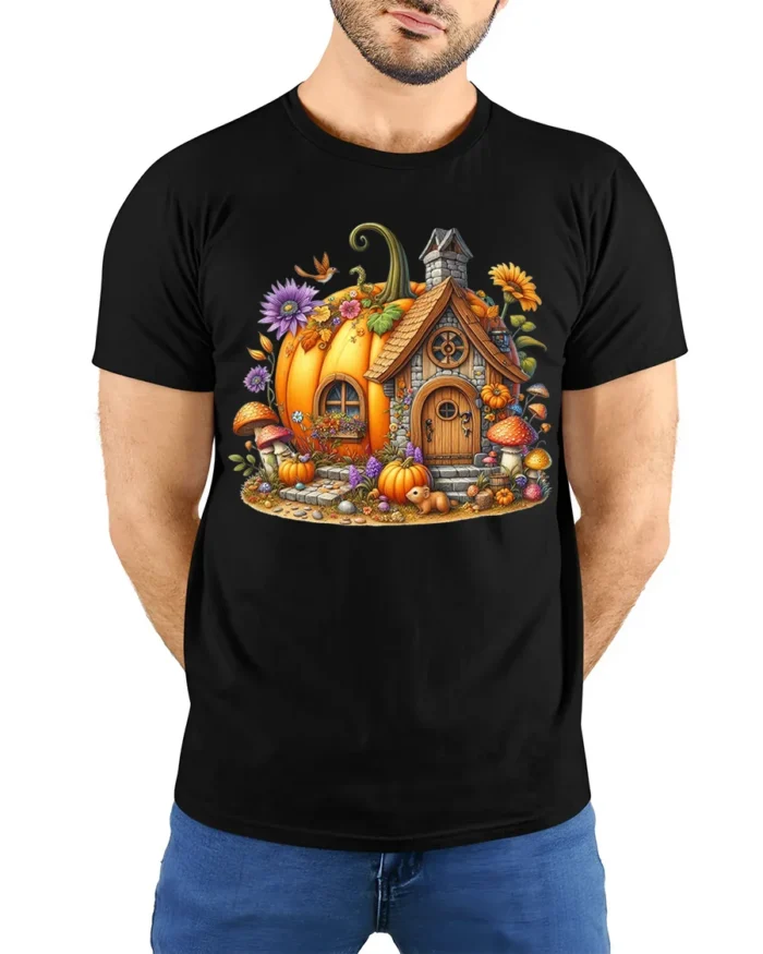 Whimsical Pumpkin Cottage Autumn T-Shirt - model wearing black shirt, hands behind back