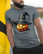 Witch Hat Jack-O’-Lantern Halloween T-Shirt - model in grey shirt leaning against column