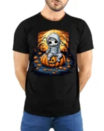 Cute Baby Mummy Sitting on Pumpkin Halloween T-shirt - model wearing black shirt, hands behind back