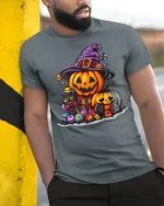 Cute Pumpkin Witch Cat Halloween Candy T-shirt - model in grey shirt leaning against column