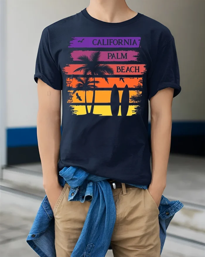 California Palm Beach Sunset Surf Graphic T-shirt - model wearing navy shirt, hands in pockets