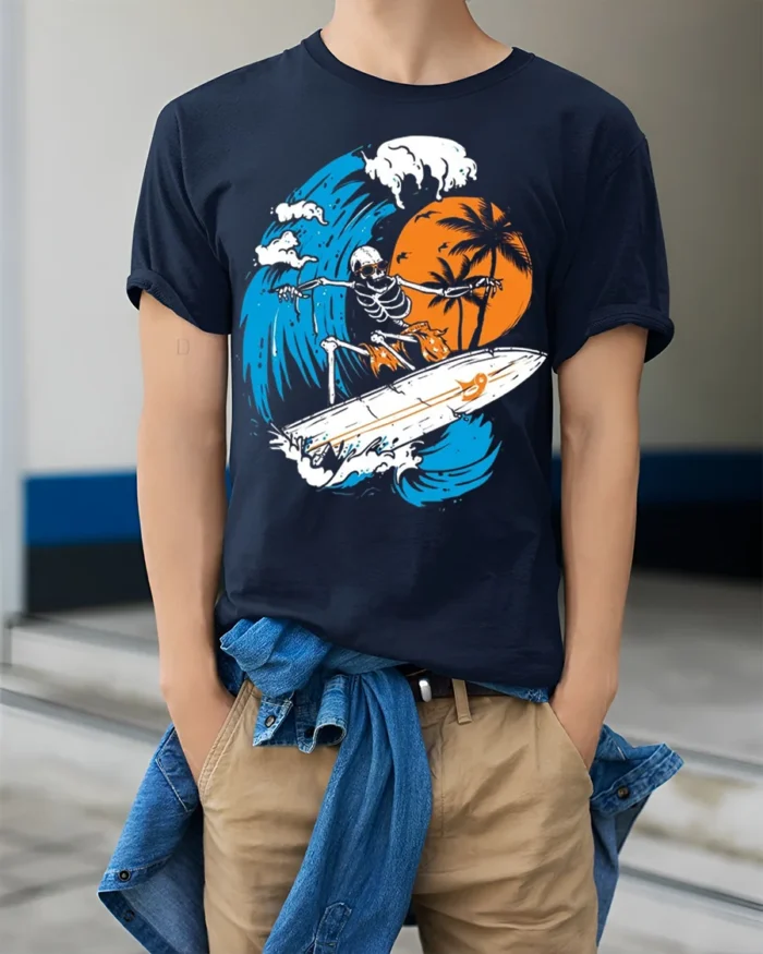 Skeleton Surfing Big Wave Sunset Graphic T-shirt - model wearing navy shirt, hands in pockets