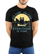 Funny Cat Everything Is Fine Graphic T-shirt - model wearing black shirt, hands behind back